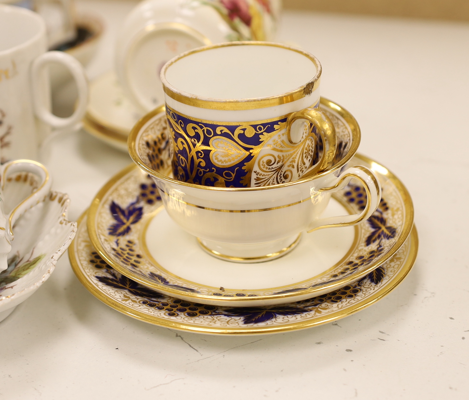 A collection of mixed 18th, 19th and 20th century Chinese and Continental teawares, including cups and sauces and two serving dishes